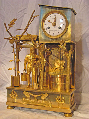 Fine brass French mantel clock with unusual butterfly pendulum, circa 1810