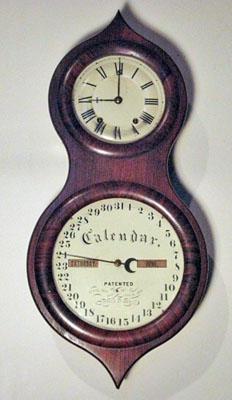 Eight day, spring powered Seth Thomas rosewood Office Calendar No. 3, better known as a Peanut clock